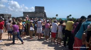 To late ! Tourists in front of the Castillo in Tulum - full size