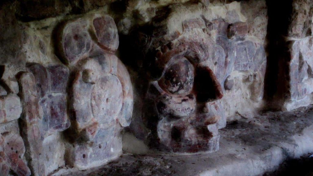 One of the masks of the sun god Kinich Ahau - from the Temple of the Masks - El Templo de los Mascarones - Detail, colors enhanced - EdznÃ¡ - Campeche